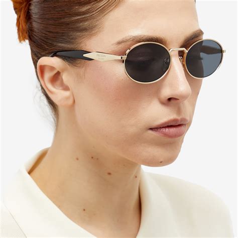 prada new round sunglasses gold|prada unisex sunglasses.